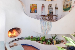 View of dining room from fireplace nook.