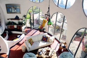 View of living room and nook from mezzanine.